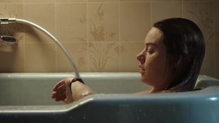 Camille Rowe not nude bath scene- The Deep House (2021)