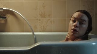 Camille Rowe not nude bath scene- The Deep House (2021)
