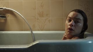 Camille Rowe not nude bath scene- The Deep House (2021)