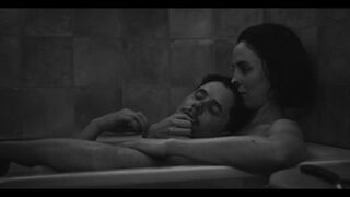 Laura Farisè naked. Sunday Poem (2021) Toless Actress in thriller scene (bathroom)