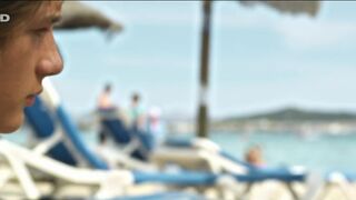 Carolina Clemente topless. Implosion (2011) Public naked scene on the beach