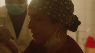 A scene of a baby being born | Hafsia Herzi topless - The Rapture (2023)