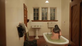 Arta Dobroshi - Stray (2018) bathroom nude scene